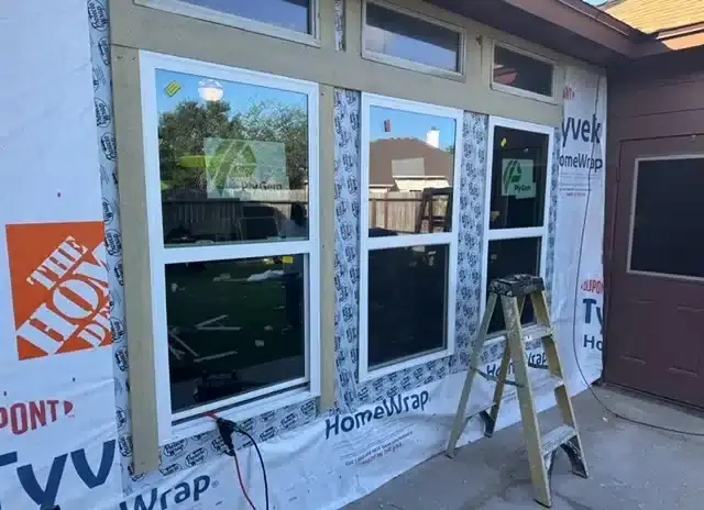 Exterior home window replacement project and roofing services