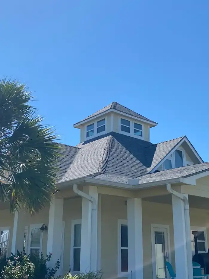 Roofing project featuring a new shingle roof and architectural details