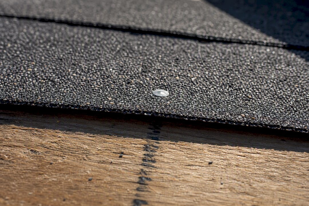 Flush nail in shingle within nailing zone